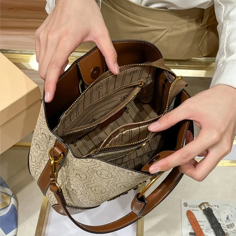 Women's handbag, genuine leather carrying bucket bag, new 2024 high-end design, fashionable single shoulder crossbody bag