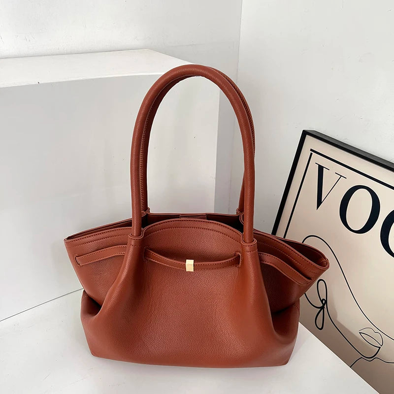 Tote bag for women with a high-end feel, unique design, large capacity, and retro style for commuting and carrying.