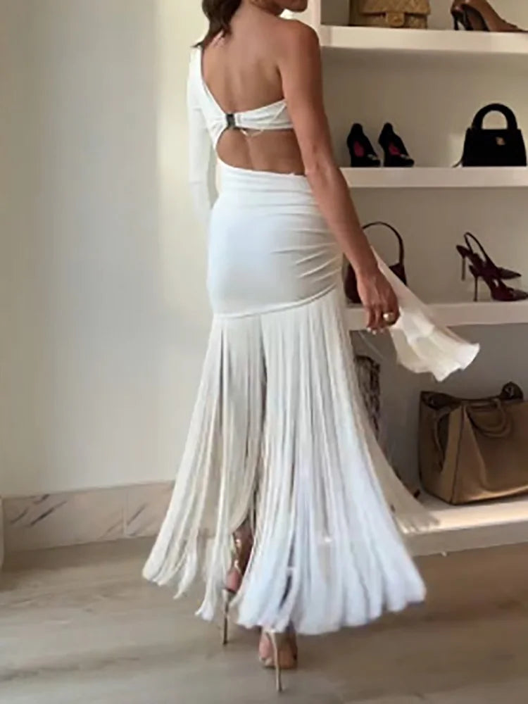 Women Sexy Hollow Out Maxi Dress Diagonal Collar One Shoulder Tassel Solid Patchwork Dress Chic Lady Bodycon Slim Fit Dresses