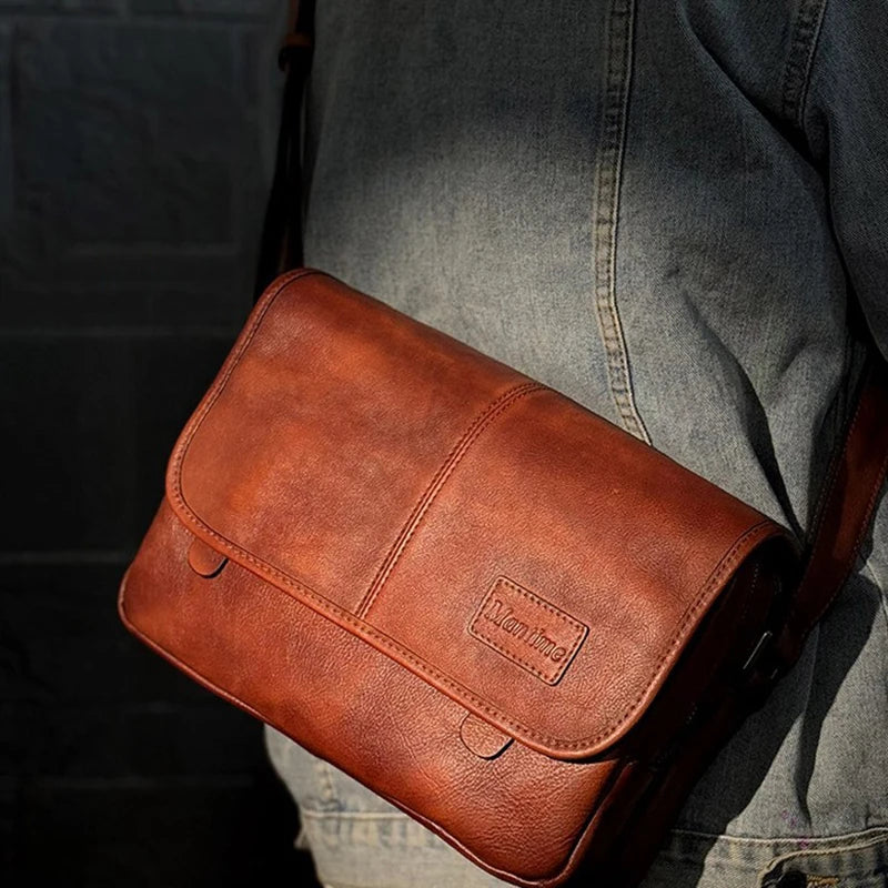 Leather shoulder bag men's messenger bag casual men's bag tide brand high-capacity leather messenger bag tooling backpack.