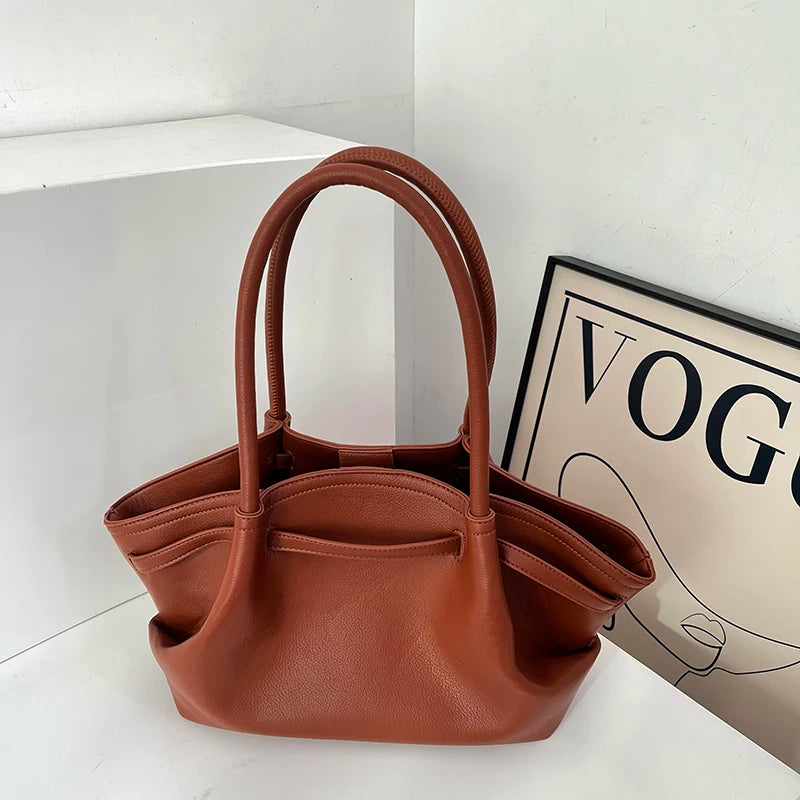 Tote bag for women with a high-end feel, unique design, large capacity, and retro style for commuting and carrying.